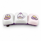 Barrette enfant chat petit pâtissier en packshot, touches blanches et rose