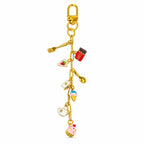 Romy la Magnétique, bijou de sac à charms personnalisable sur chaîne dorée avec breloques gourmandes